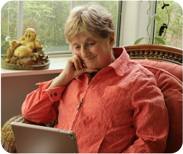 Betsy sitting near a window